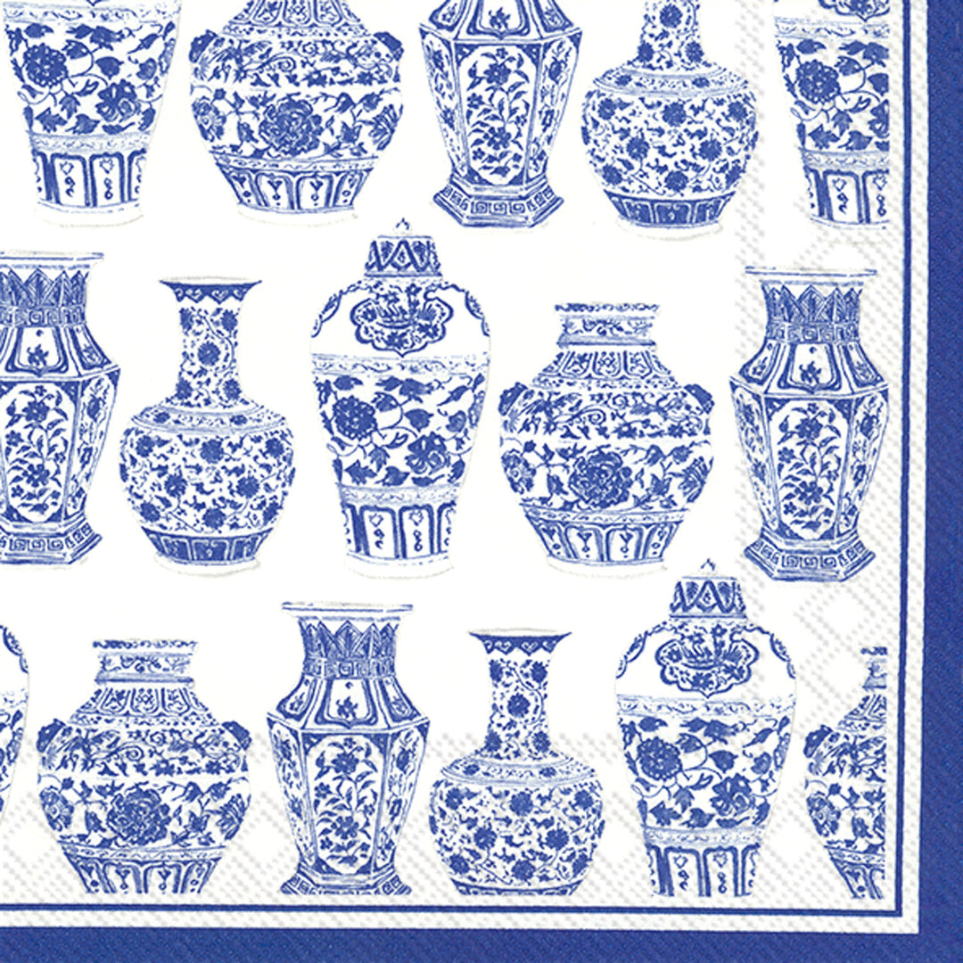 Servilleta de cóctel con urnas azules y blancas