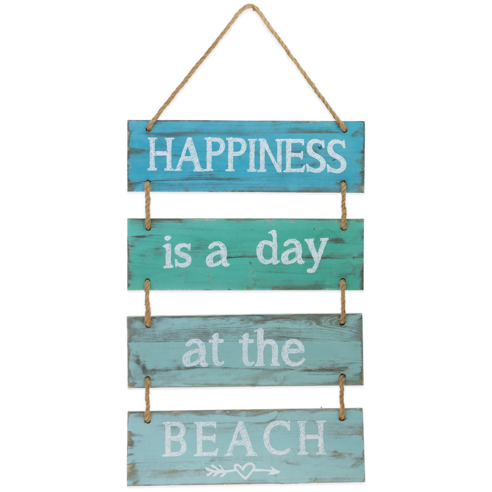 Letrero de felicidad en la playa