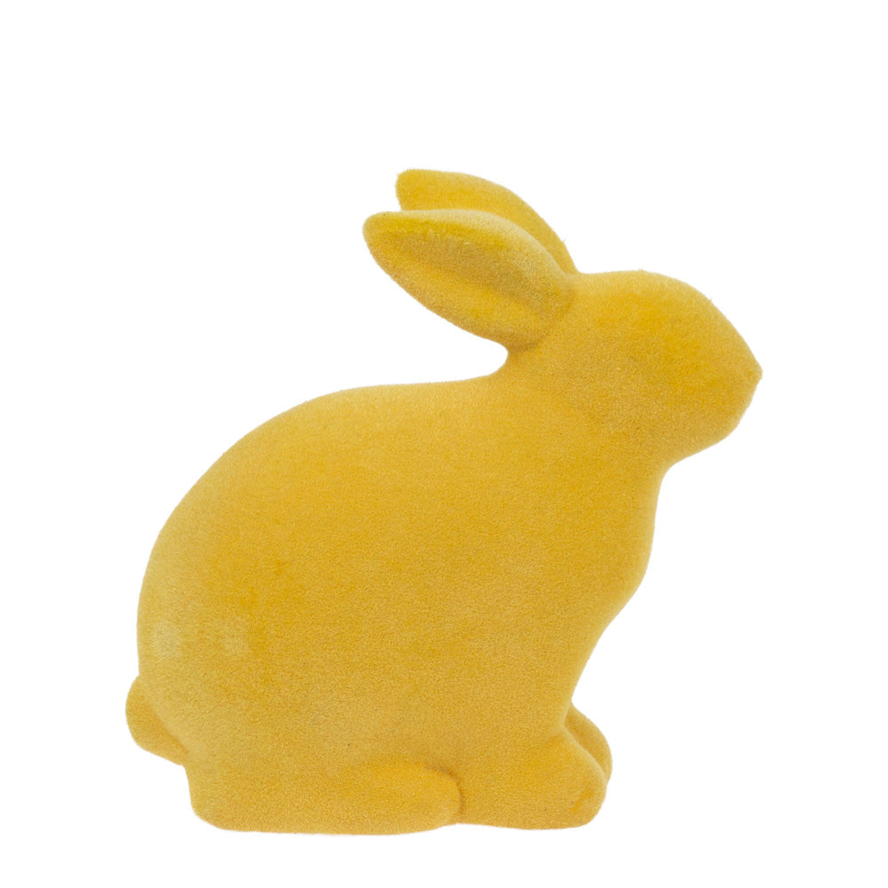Conejito amarillo flocado sentado